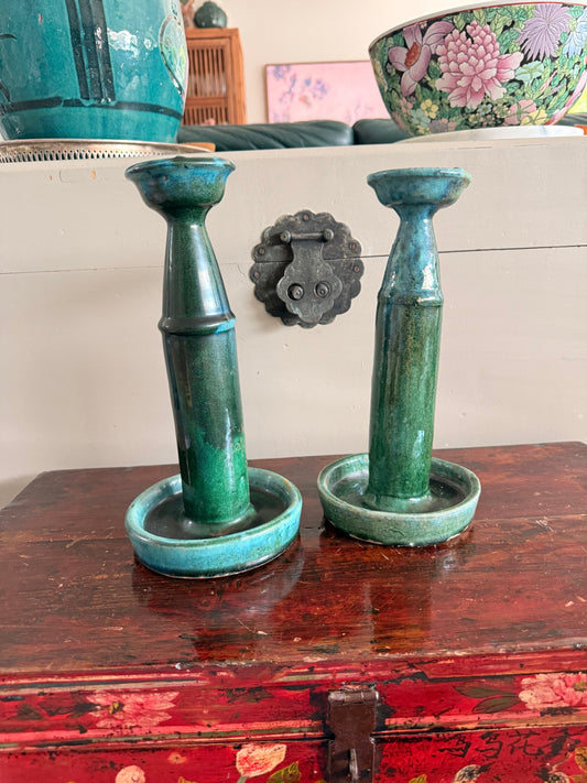 Tall pair of green glazed antique oil lamps