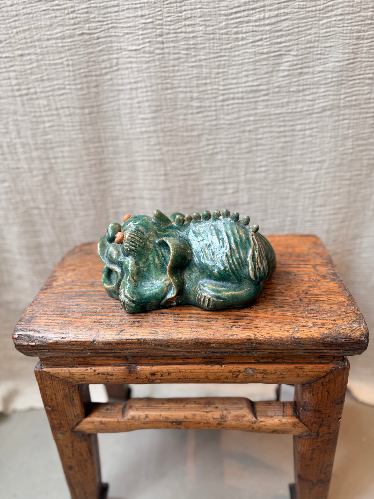 Foo dog / lion green glazed figurine