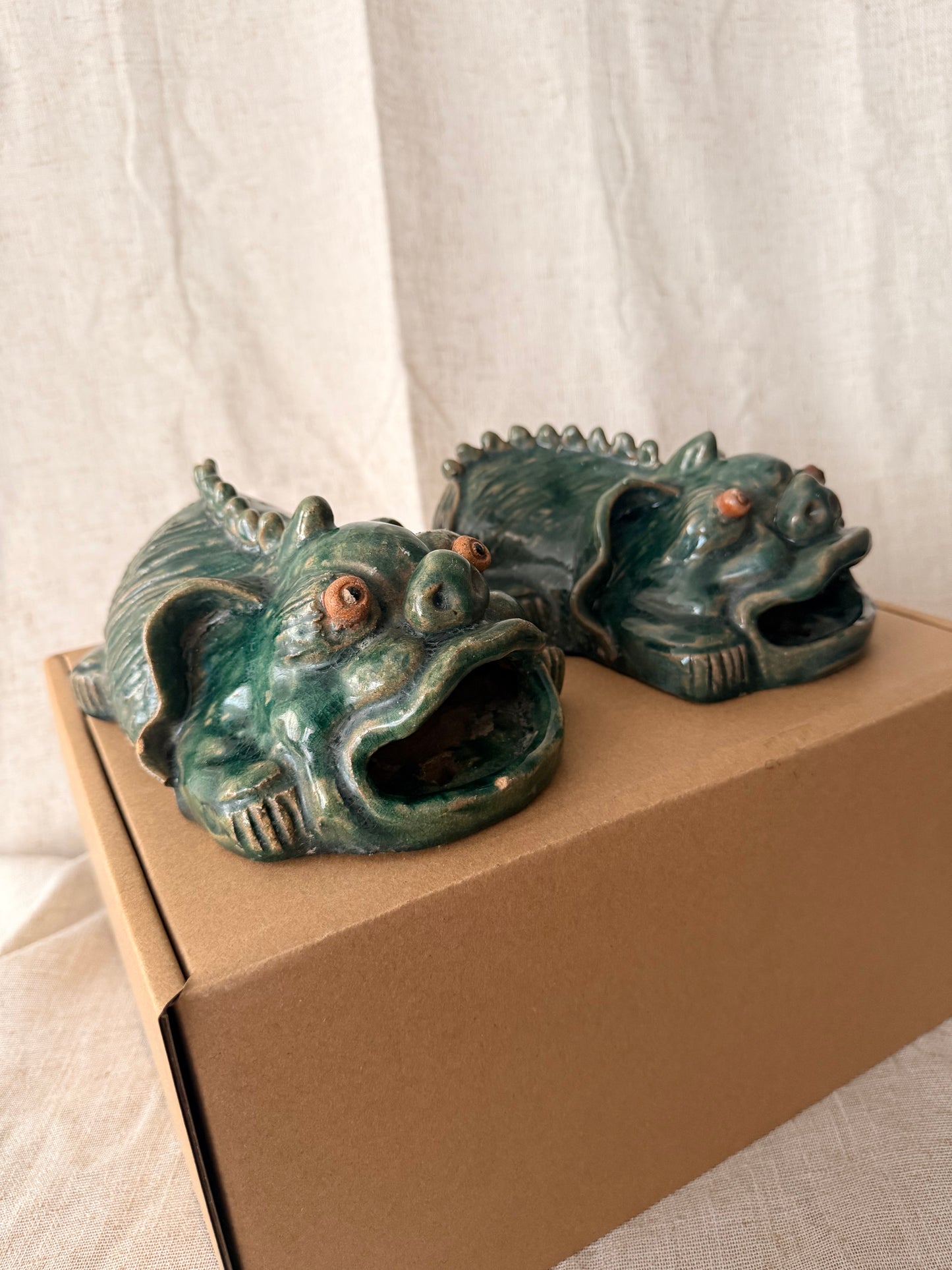 Foo dog / lion green glazed figurine