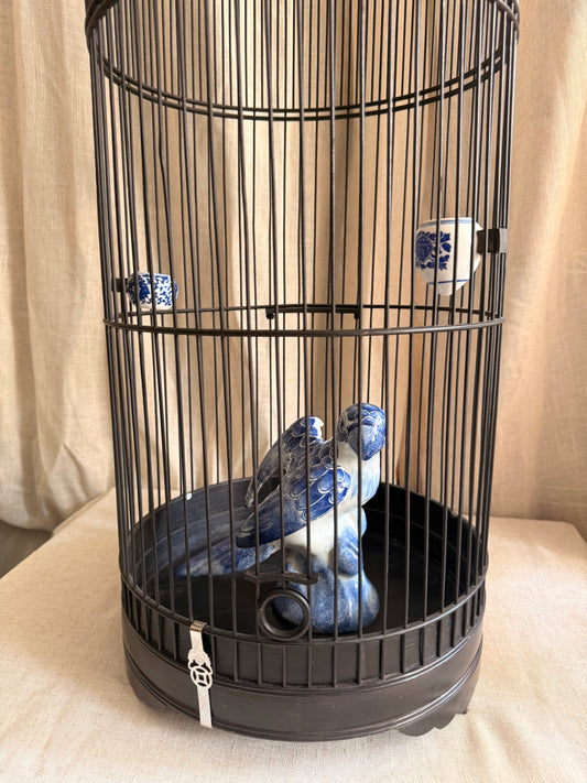 Bamboo bird cage & blue ceramic Parrot Statue