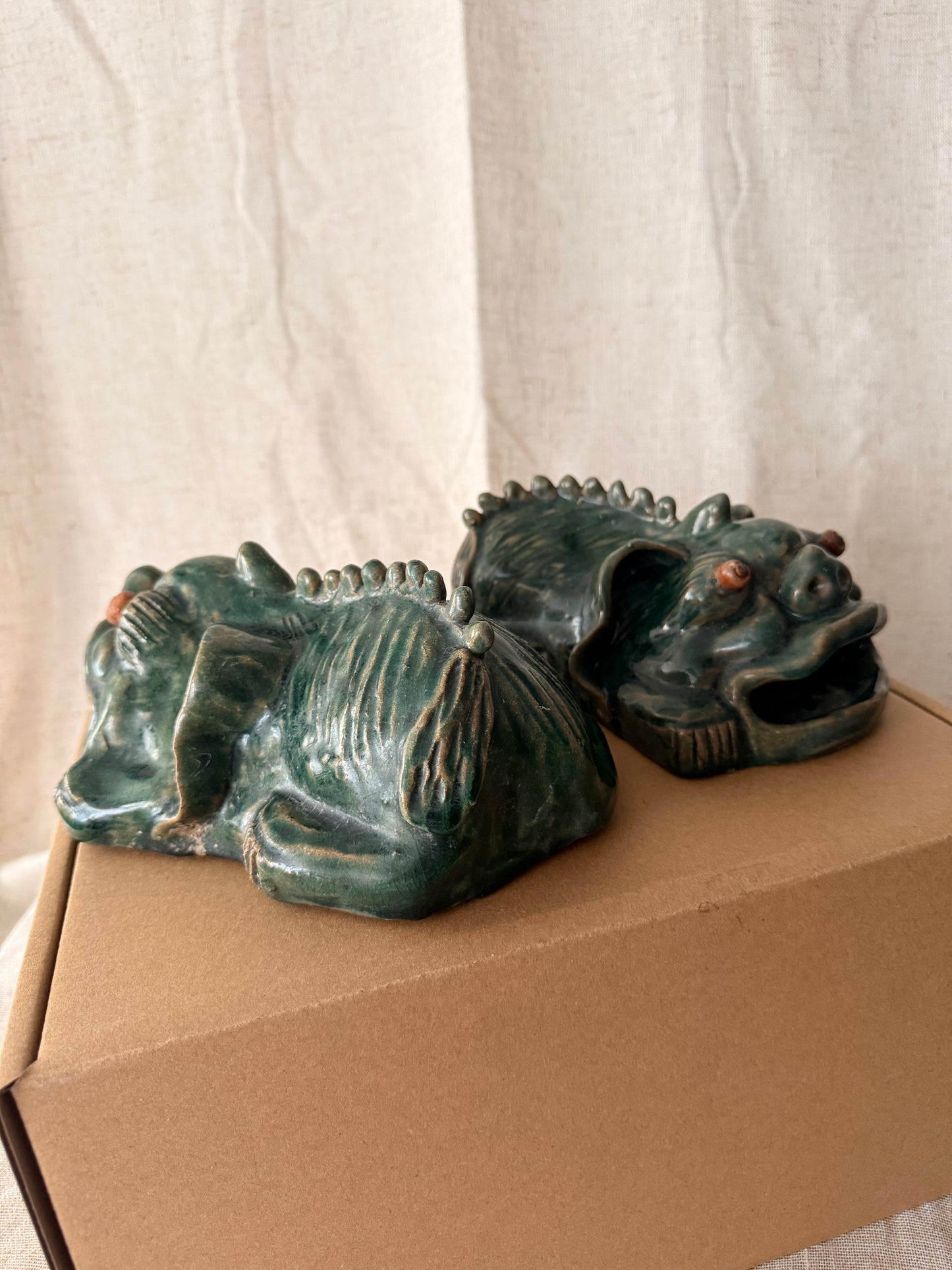 Foo dog / lion green glazed figurine