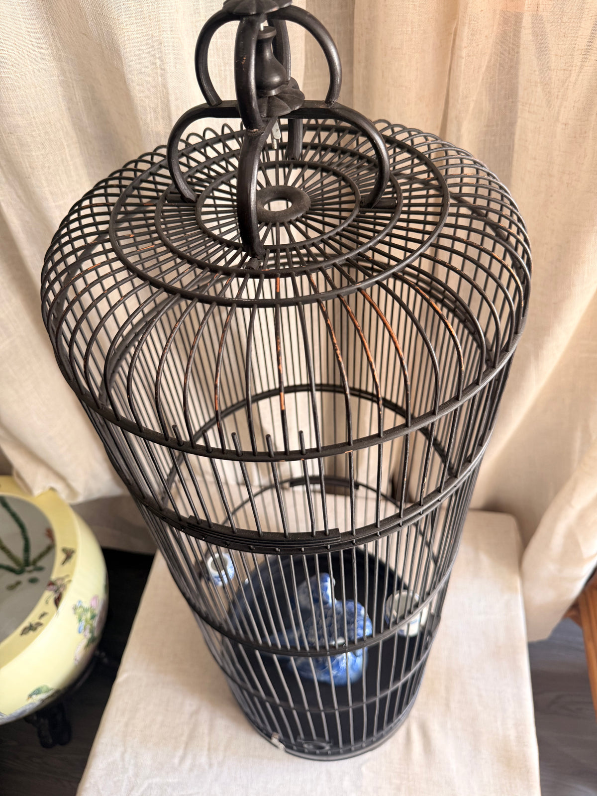 Bamboo bird cage & blue ceramic Parrot Statue