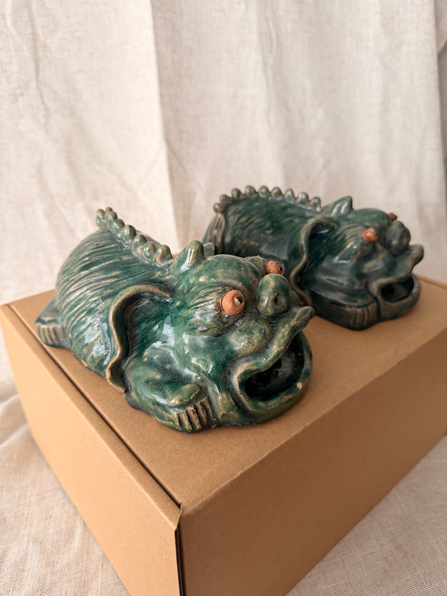Foo dog / lion green glazed figurine
