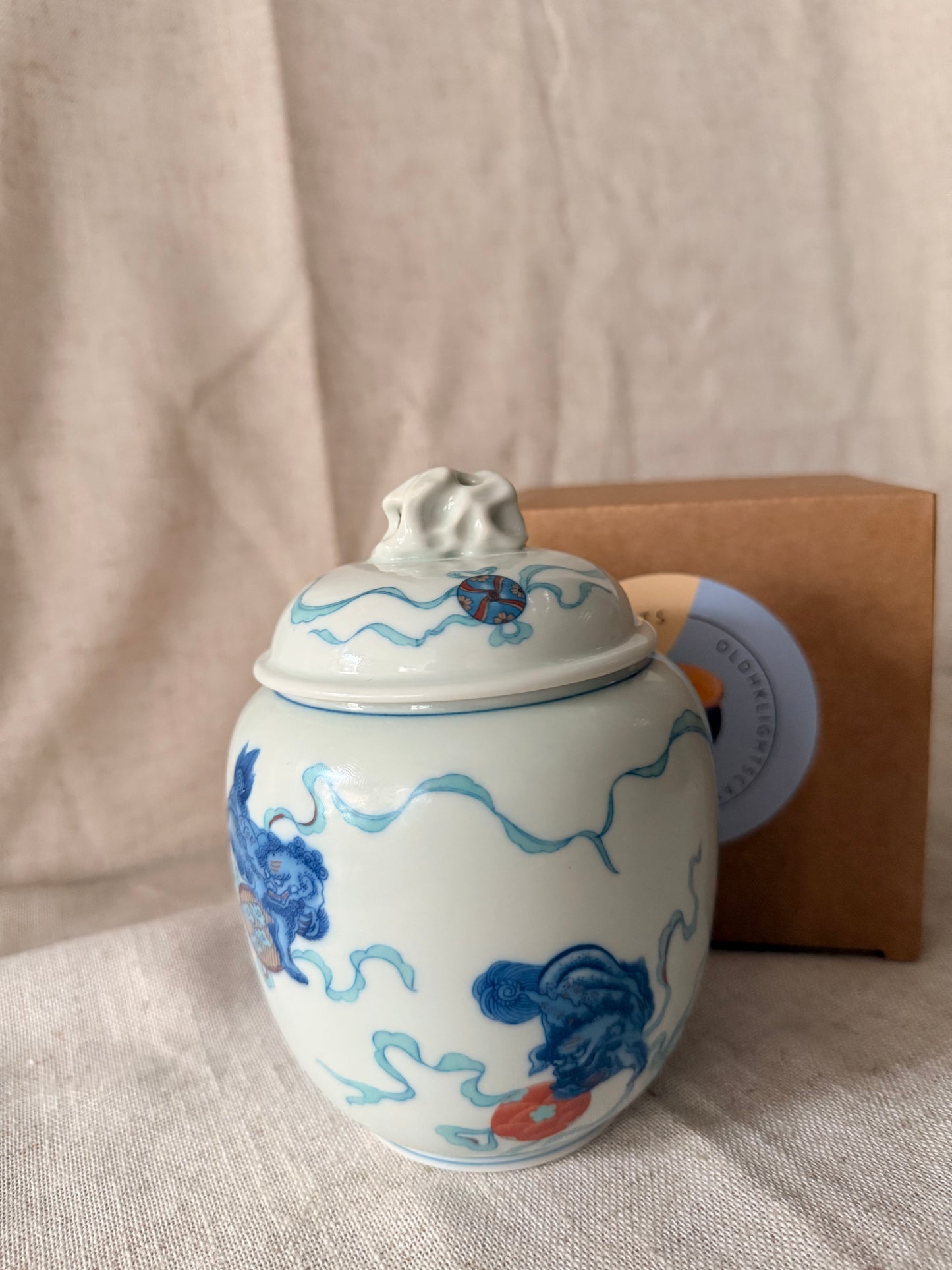 Blue and red Lion tea box Candle