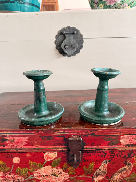 Pair of antique green glazed oil lamps /candle holders