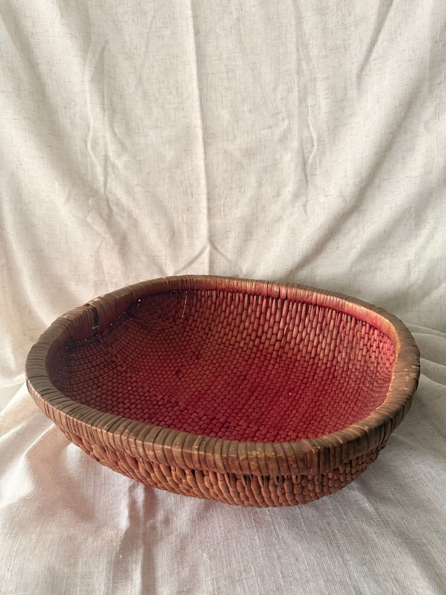 Bright pink rice straw basket