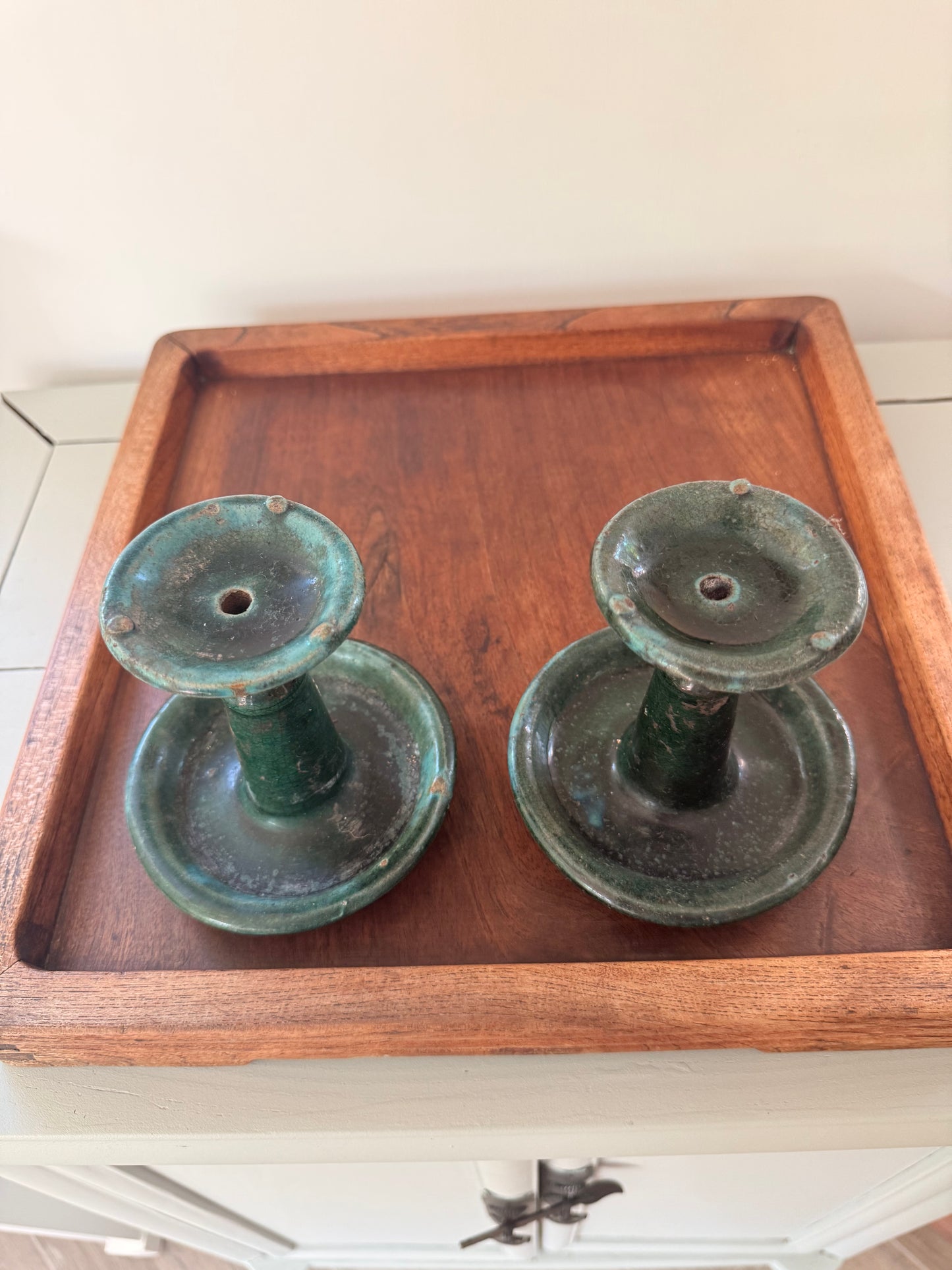 Pair of antique green glazed oil lamps /candle holders