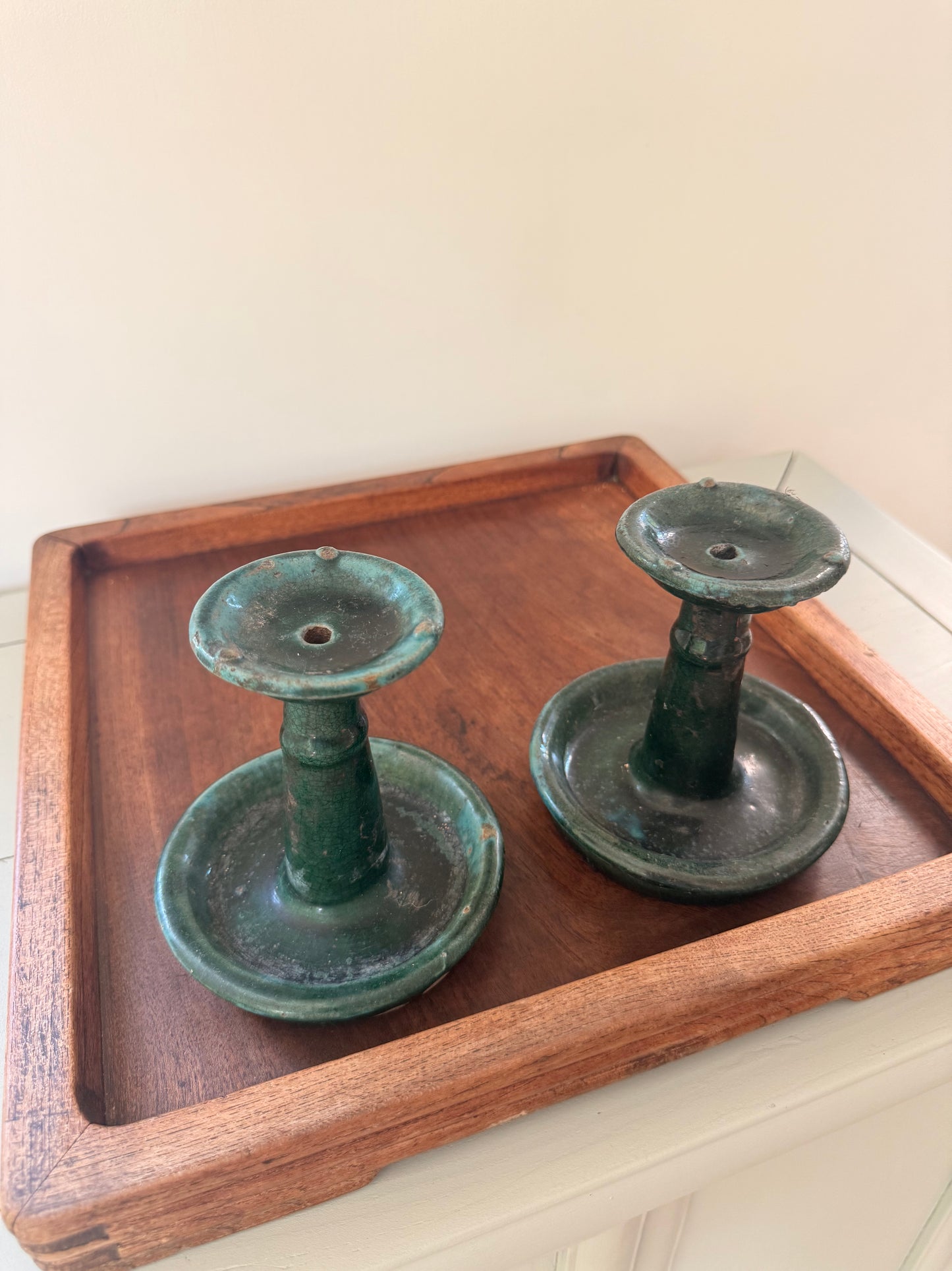 Pair of antique green glazed oil lamps /candle holders