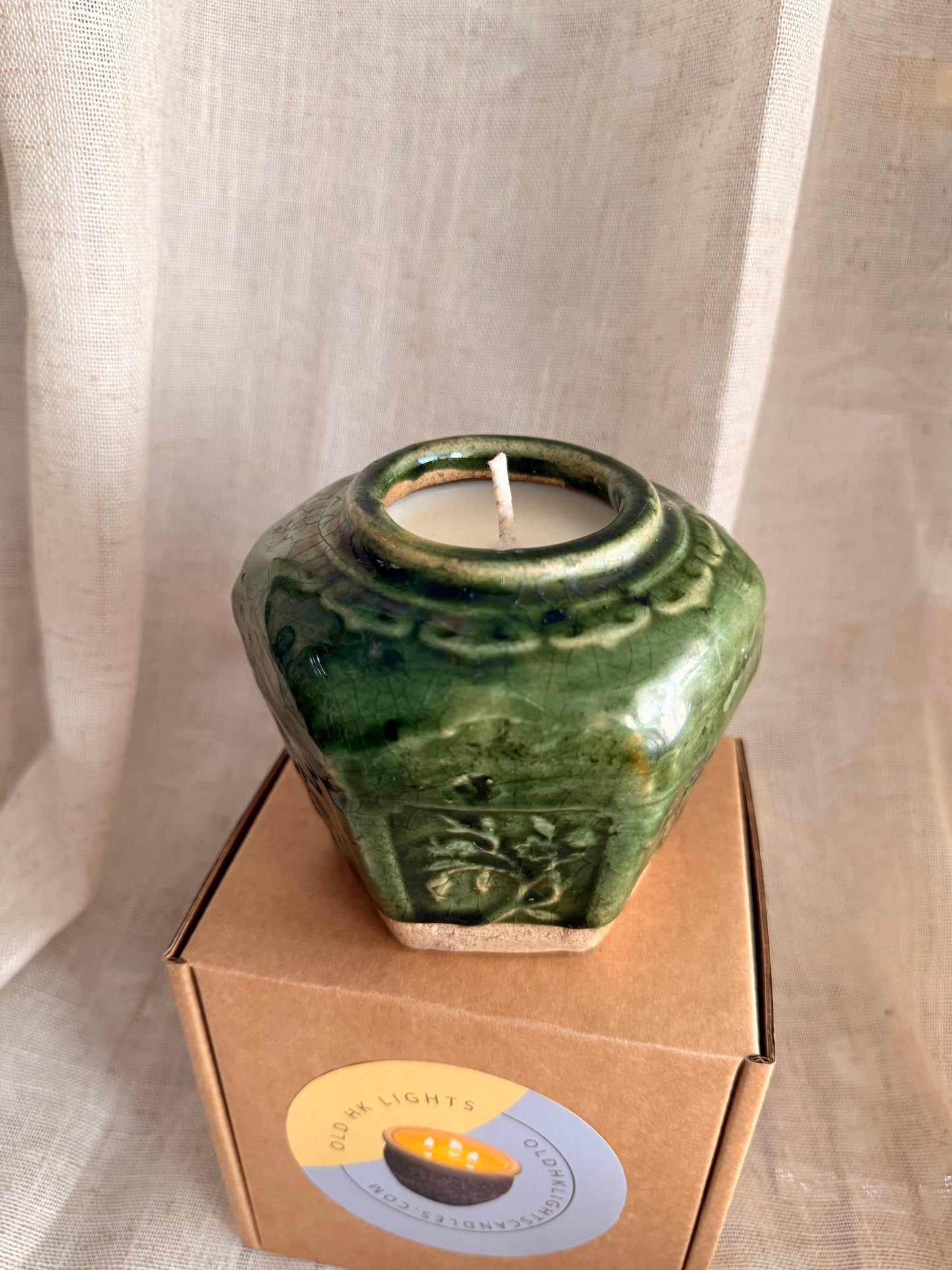 Antique small green jar candle