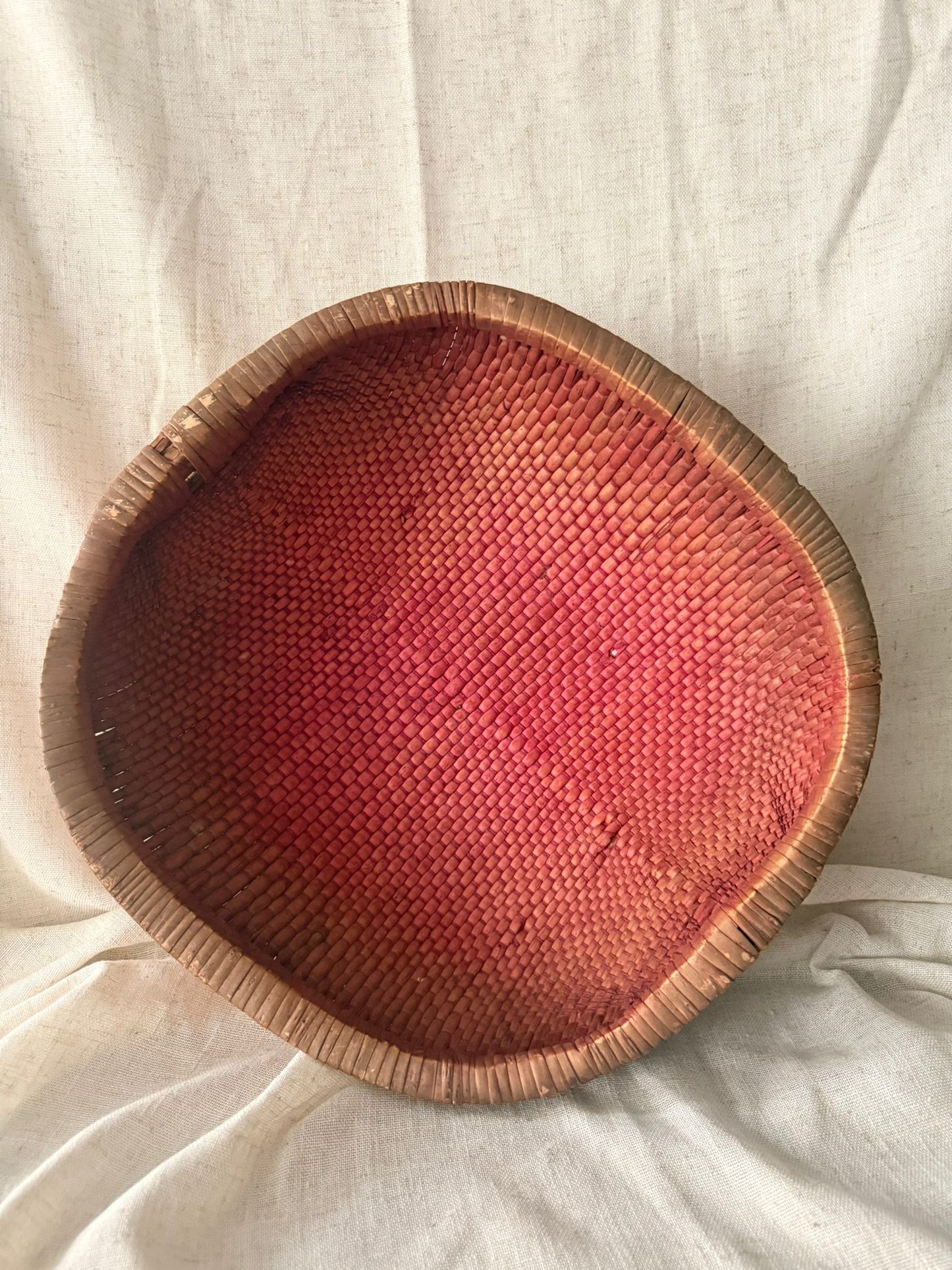 Bright pink rice straw basket