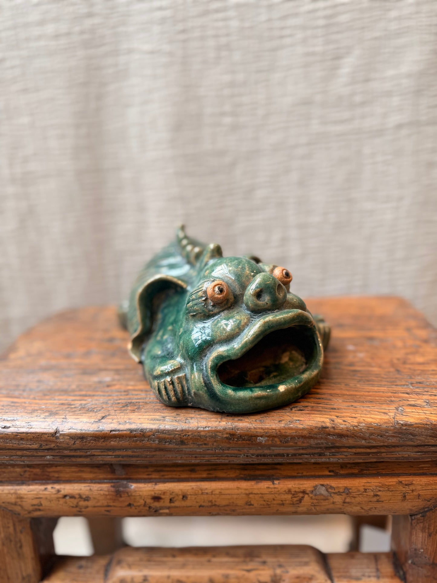 Foo dog / lion green glazed figurine