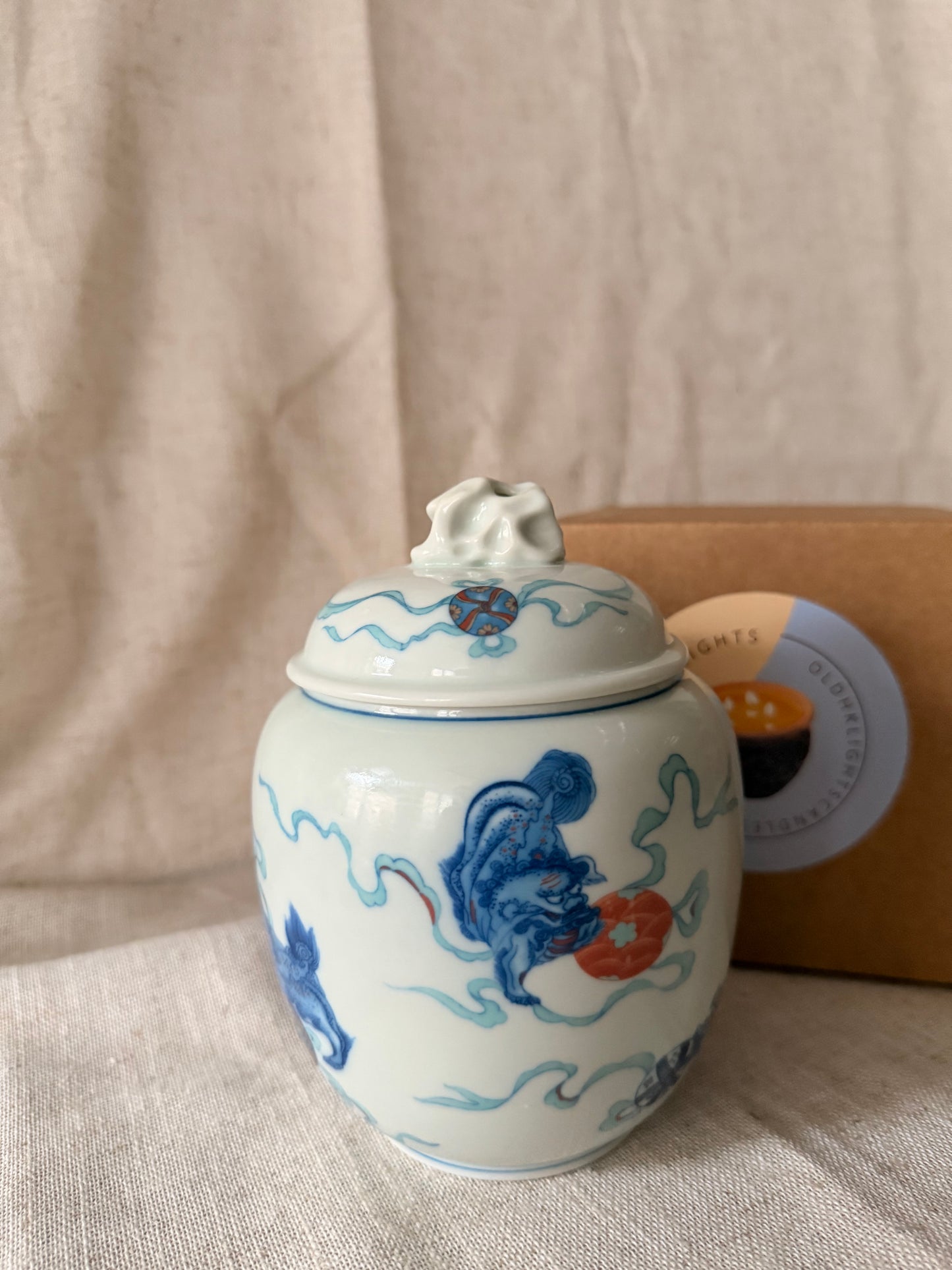 Blue and red Lion tea box Candle