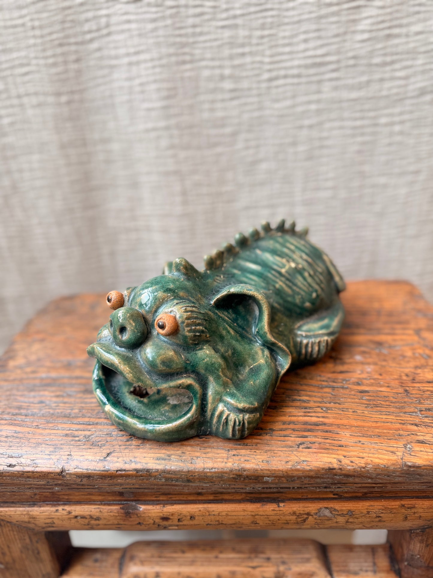 Foo dog / lion green glazed figurine
